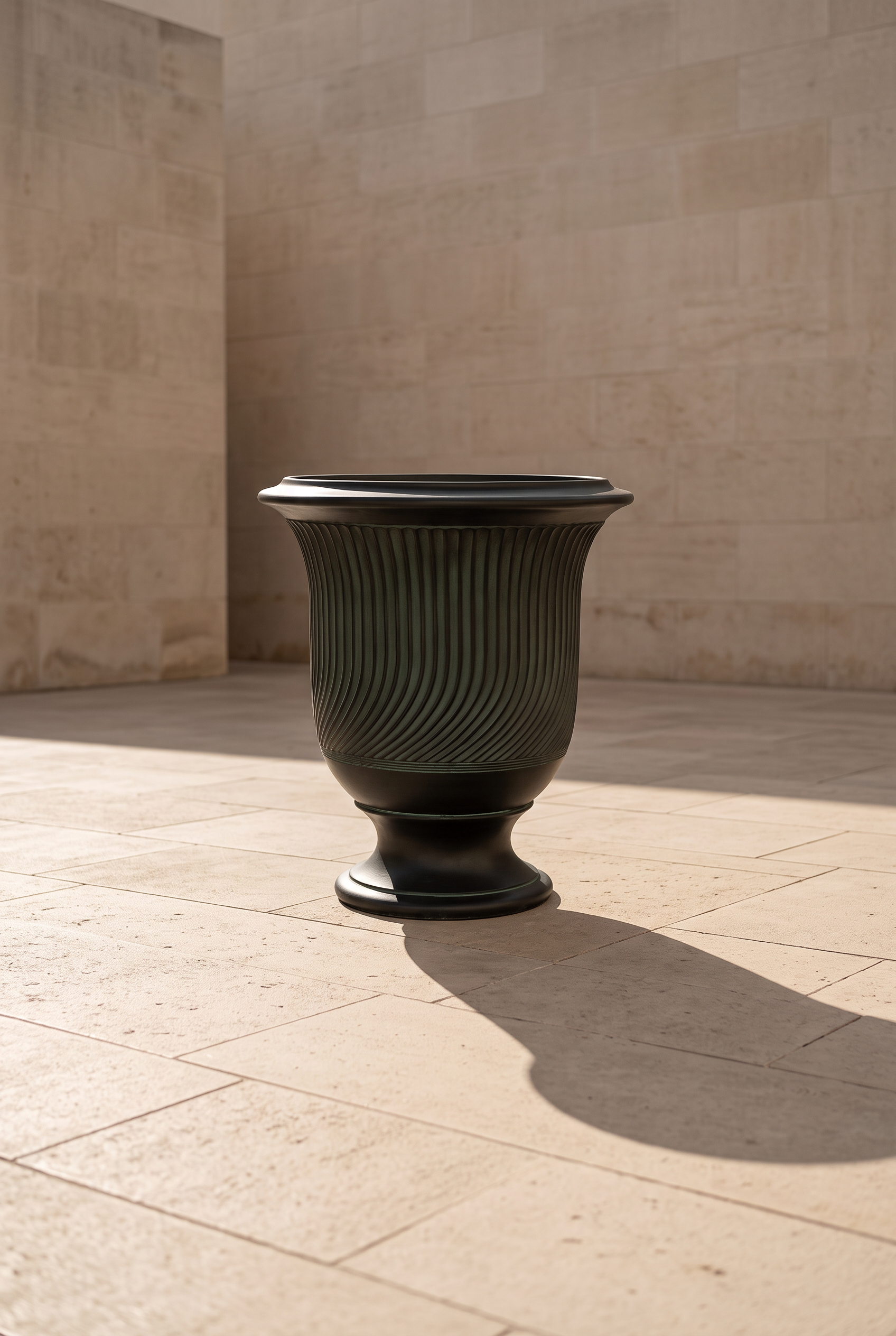 Pietro Anduze Spiral Urn Large in a limestone architectural setting